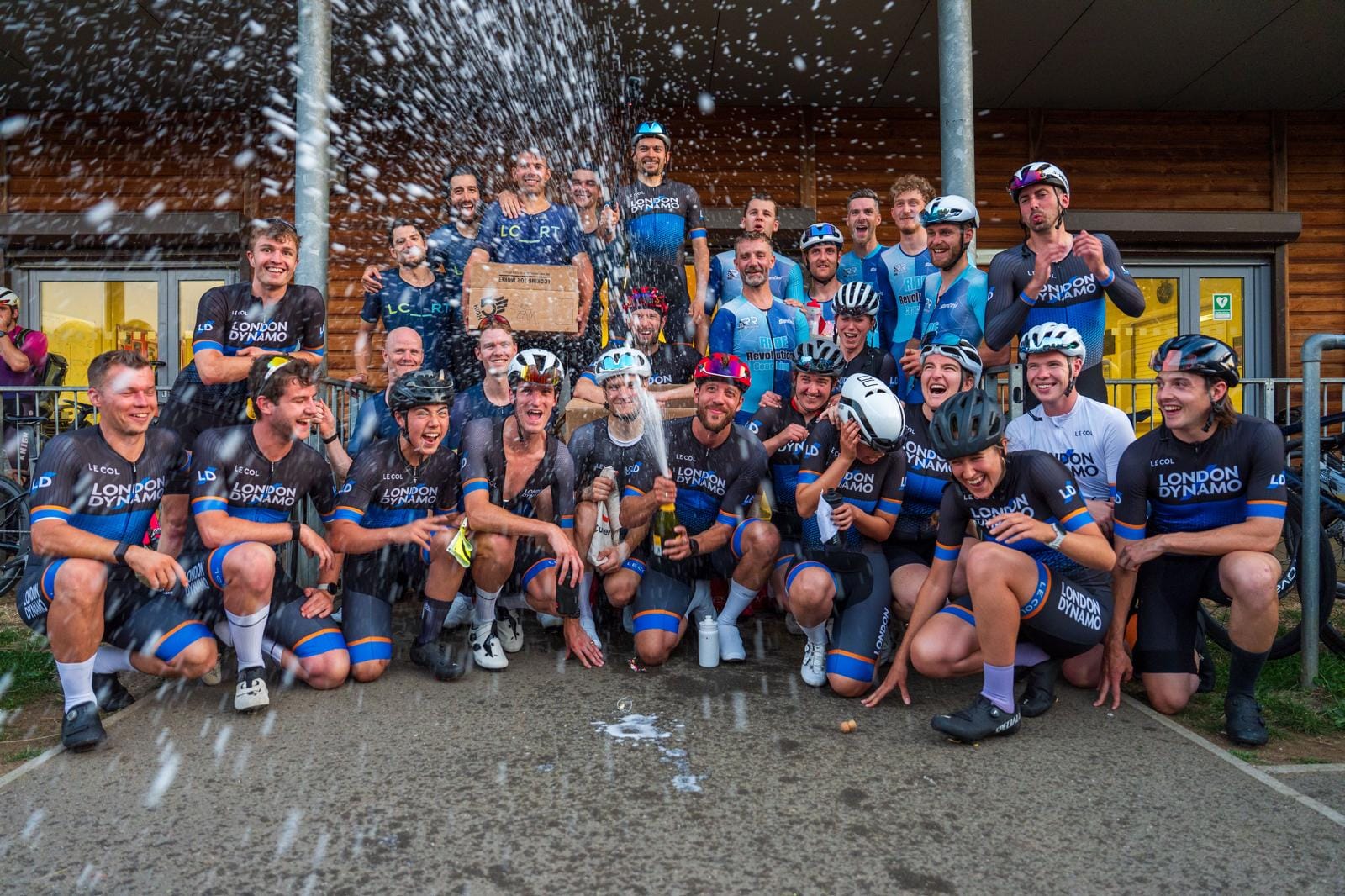 London Dynamo race team spraying champagne after winning the West Thames League