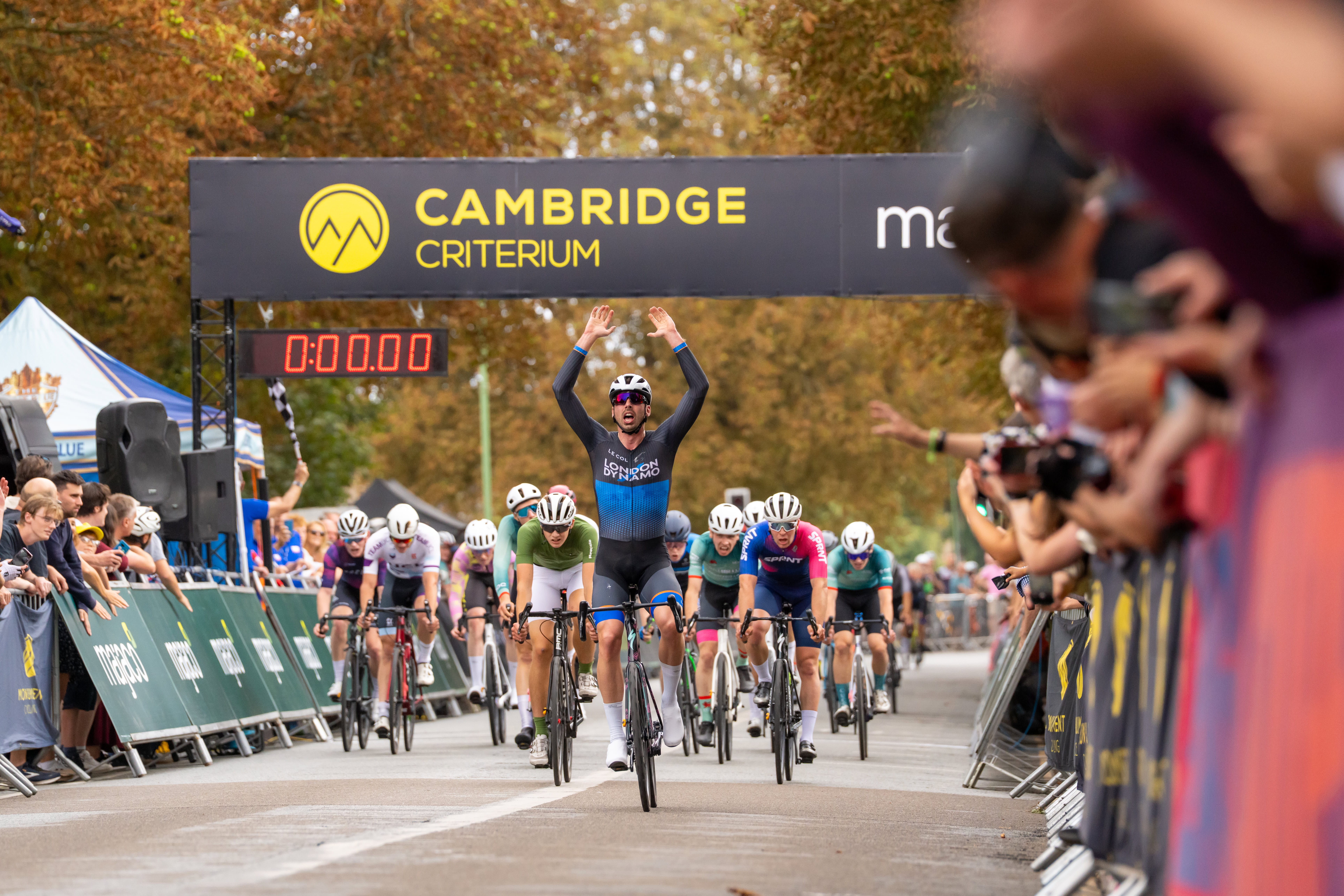 London Dynamo celebrating crossing the finish line after winning the Cambridge Criterium