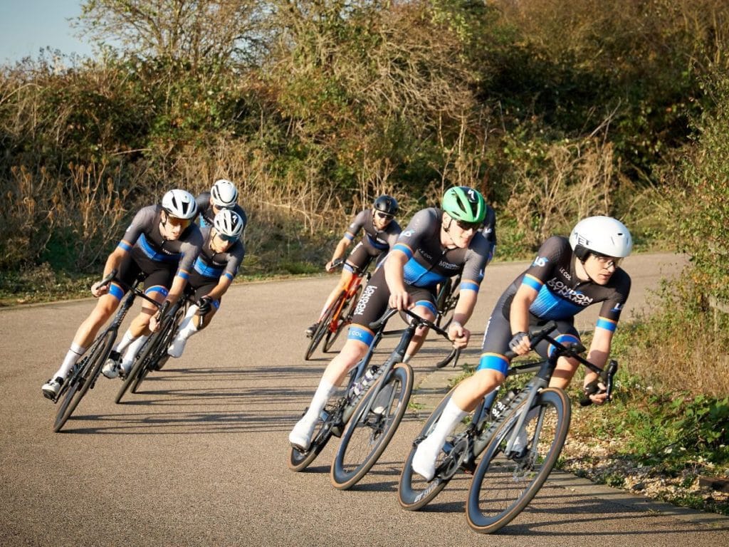 London Dynamo riders cornering in a group during a club race