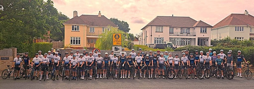 A large group of London Dynamo riders in club kit lined up before the Isle of Wight ride